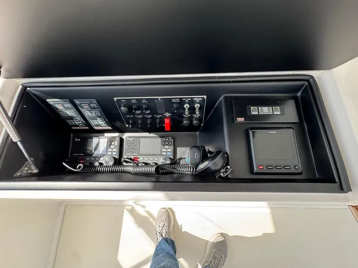 Yacht Photos Pics Control panel of a 2007 Viking 52 Convertibles yacht, featuring navigation and communication equipment.