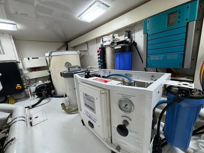  Yacht Photos Pics Engine room of 2007 Viking 52 Convertibles yacht with water filtration system.