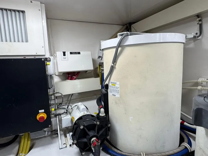  Yacht Photos Pics Engine room of 2007 Viking 52 Convertibles yacht with machinery and equipment.