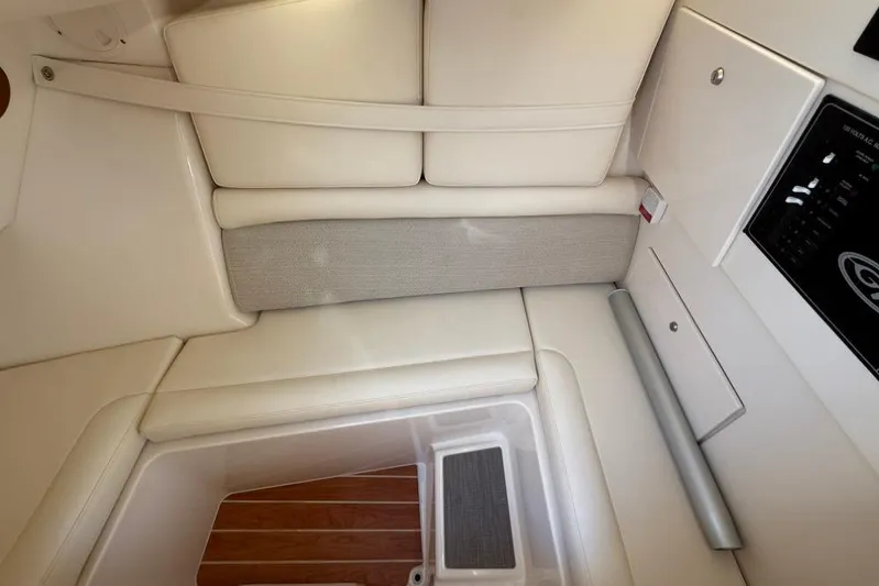  Yacht Photos Pics 2023 Grady-White Freedom 325 interior with beige seating and control panel.