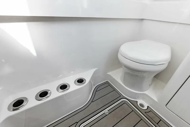  Yacht Photos Pics 2021 Valhalla Boatworks V-37 interior with modern marine toilet and sleek design.
