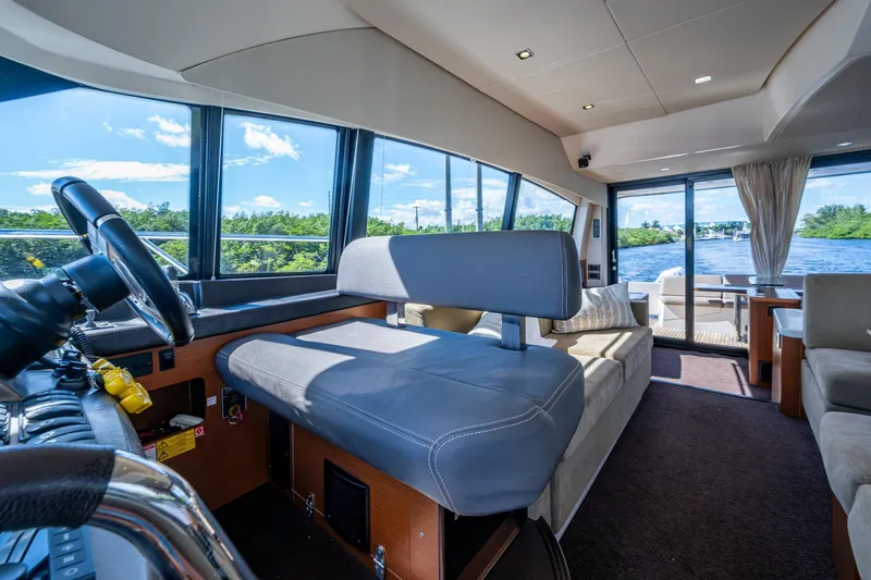  Yacht Photos Pics Luxurious 2012 Prestige Flybridge yacht interior with scenic water view.