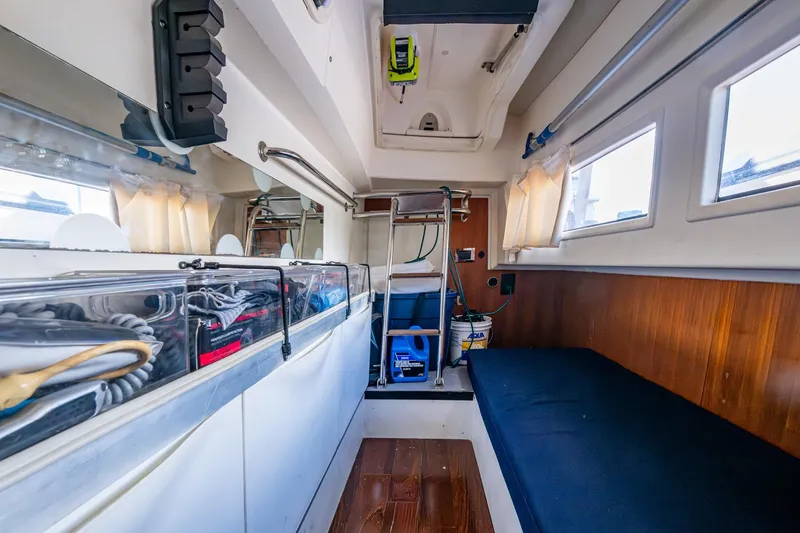  Yacht Photos Pics Interior of 2012 Prestige Flybridge yacht with storage and seating area.