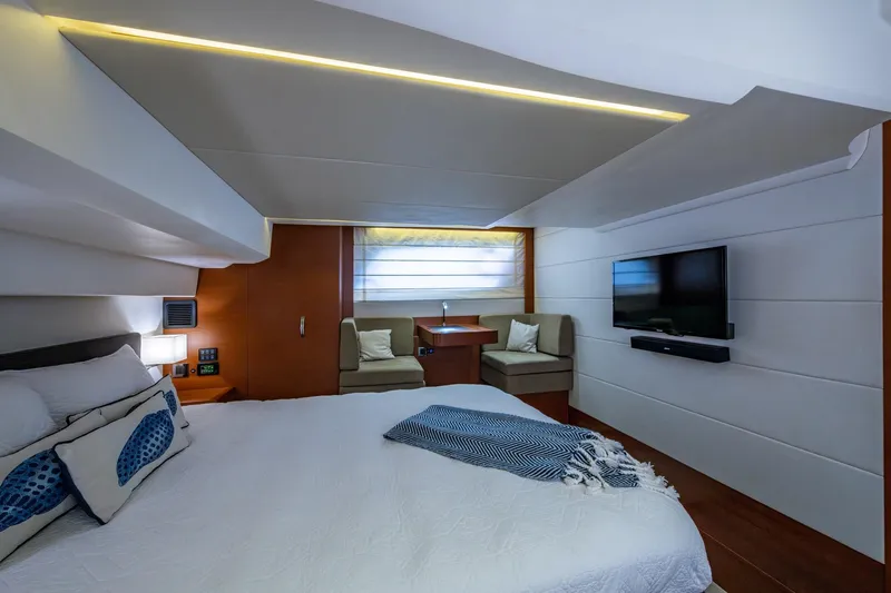  Yacht Photos Pics Luxurious cabin interior of 2012 Prestige Flybridge yacht with modern amenities.