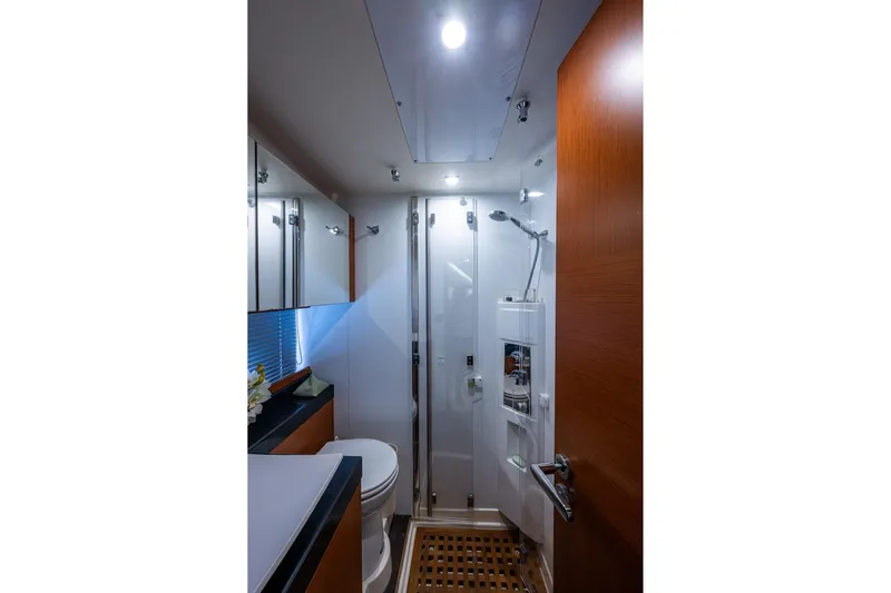 Yacht Photos Pics Luxurious bathroom in 2012 Prestige Flybridge yacht with modern fixtures and elegant design.