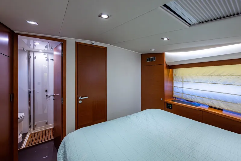  Yacht Photos Pics Luxurious 2012 Prestige Flybridge yacht bedroom with ensuite bathroom and modern design.
