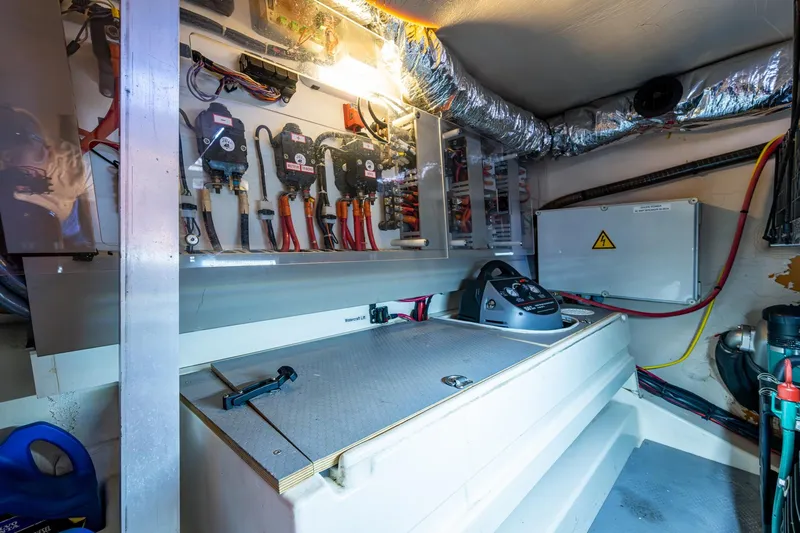  Yacht Photos Pics Engine room of 2012 Prestige Flybridge yacht with electrical components and wiring.