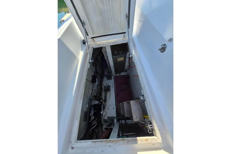 Laissez Faire Yacht Photos Pics Open engine compartment of 1993 Ocean Alexander 423 Classicco yacht, showcasing internal components.