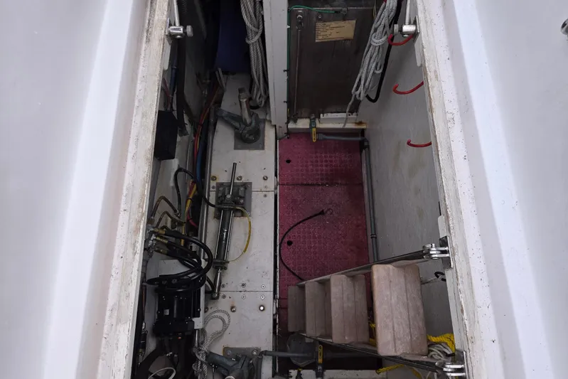 Laissez Faire Yacht Photos Pics Engine compartment of 1993 Ocean Alexander 423 Classicco with visible wiring and equipment.