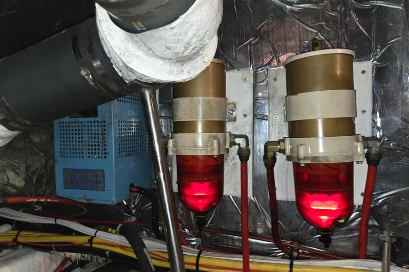 Laissez Faire Yacht Photos Pics Engine room of 1993 Ocean Alexander 423 Classicco with fuel filters and piping.