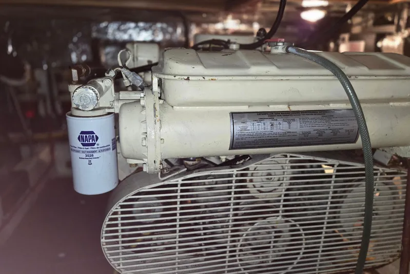 Laissez Faire Yacht Photos Pics Engine compartment of 1993 Ocean Alexander 423 Classicco with NAPA filter visible.