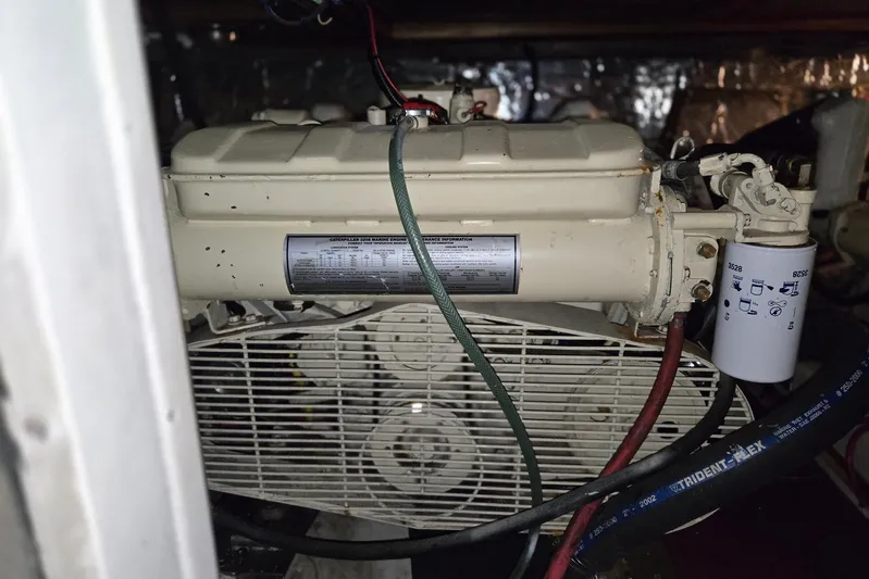 Laissez Faire Yacht Photos Pics Engine compartment of a 1993 Ocean Alexander 423 Classicco yacht, featuring mechanical components.