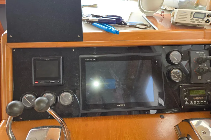 Laissez Faire Yacht Photos Pics Control panel of a 1993 Ocean Alexander 423 Classicco yacht with Garmin GPS and gauges.