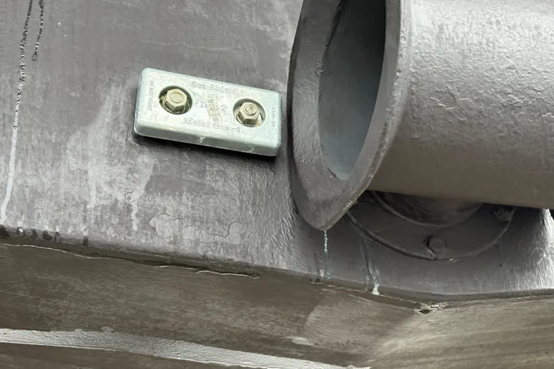 Laissez Faire Yacht Photos Pics Close-up of Ocean Alexander 423 Classico 1993 boat hull with zinc anode.