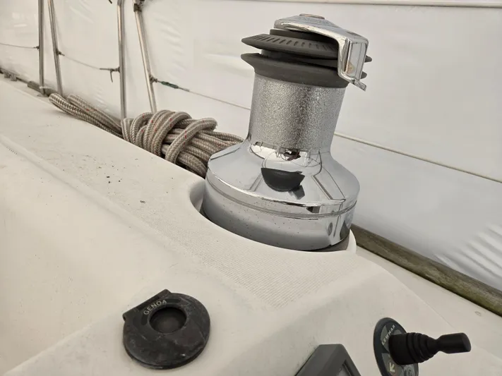 Surprise Yacht Photos Pics Winch on 2007 Beneteau 49 sailboat deck with coiled ropes.