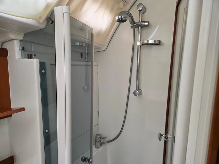 Surprise Yacht Photos Pics Shower area in a 2007 Beneteau 49 yacht, featuring modern fixtures.