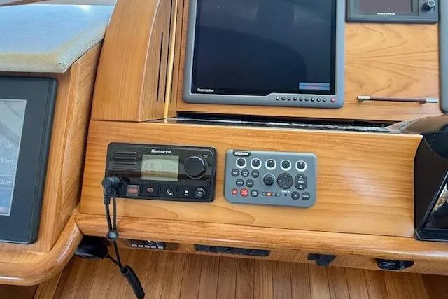 Jesse James Yacht Photos Pics Control panel of 2011 Tiara Yachts 5800 Sovran with navigation equipment.