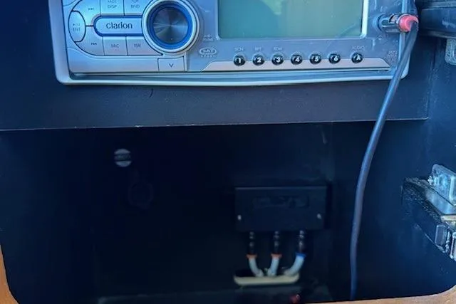 Jesse James Yacht Photos Pics Clarion audio system in 2011 Tiara Yachts 5800 Sovran, featuring control panel and wiring.