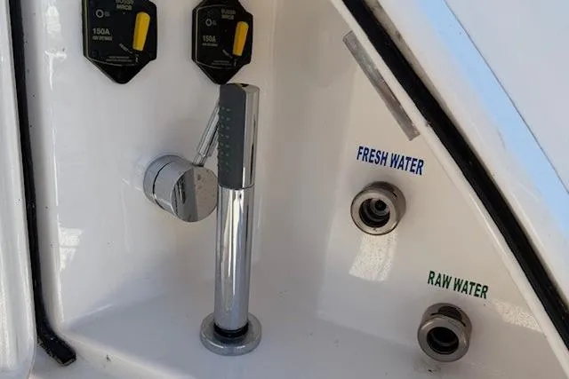 Jesse James Yacht Photos Pics Tiara Yachts 5800 Sovran 2011 water connections and faucet detail.