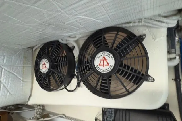 Jesse James Yacht Photos Pics Engine room fans in a 2011 Tiara Yachts 5800 Sovran.