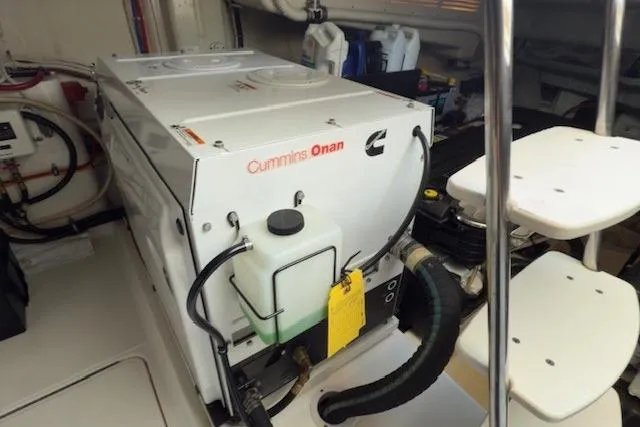 Jesse James Yacht Photos Pics Cummins Onan generator in 2011 Tiara Yachts 5800 Sovran engine room.