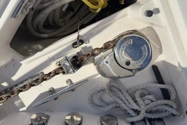 Jesse James Yacht Photos Pics Anchor chain and winch on 2011 Tiara Yachts 5800 Sovran deck.