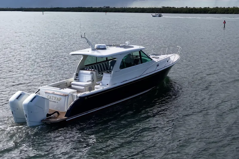 Catnap Yacht Photos Pics 2023 Hinckley Sport Boat 40 X cruising on calm waters.