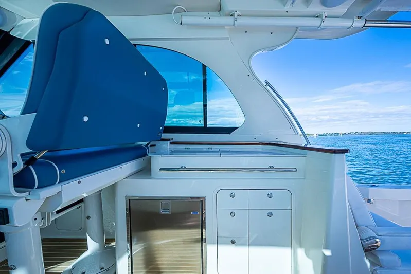 Catnap Yacht Photos Pics 2023 Hinckley Sport Boat 40 X interior with blue seating and ocean view.