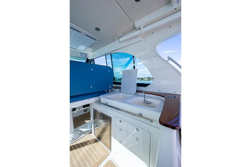 Catnap Yacht Photos Pics 2023 Hinckley Sport Boat 40 X interior with sink and seating area.