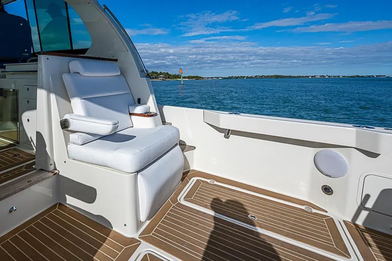Catnap Yacht Photos Pics Luxury seating on 2023 Hinckley Sport Boat 40 X, overlooking serene ocean view.