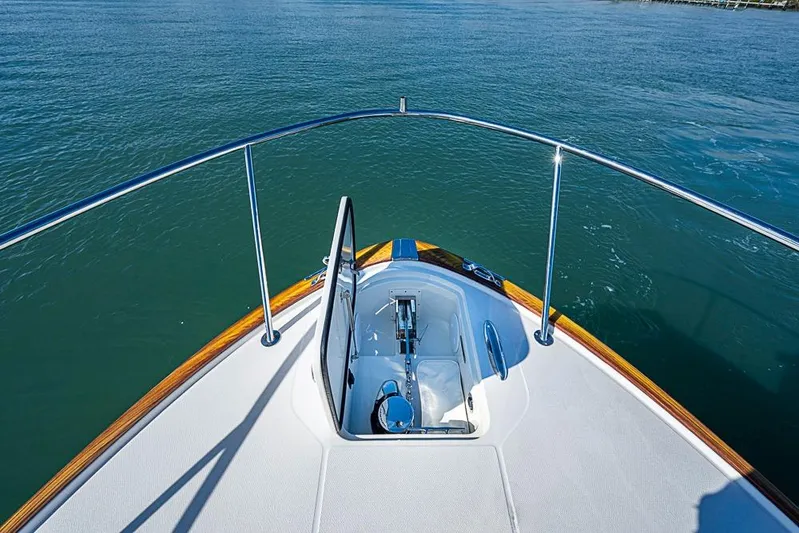 Catnap Yacht Photos Pics 2023 Hinckley Sport Boat 40 X bow view on calm water.