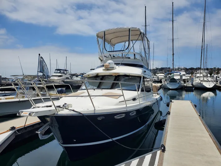  Yacht Photos Pics 2016 Cutwater 30 Command Bridge yacht docked in marina.