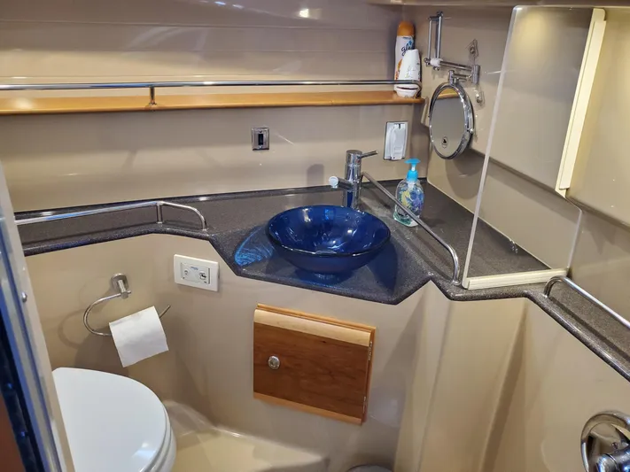  Yacht Photos Pics 2016 Cutwater 30 Command Bridge bathroom with modern sink and fixtures.