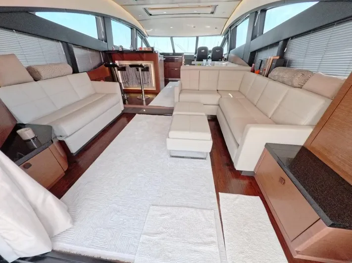  Yacht Photos Pics Luxurious interior of 2016 Sea Ray L650 Fly yacht with elegant seating and modern design.
