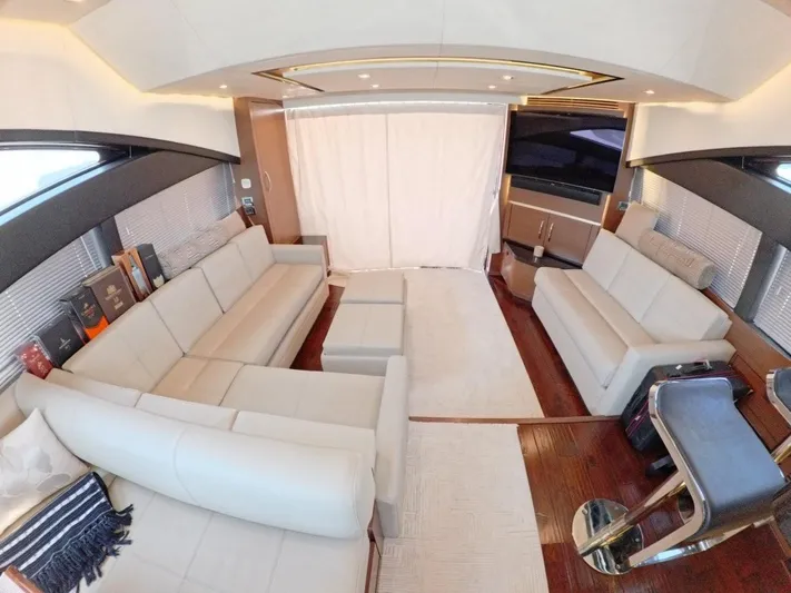  Yacht Photos Pics Luxurious interior of 2016 Sea Ray L650 Fly yacht with elegant seating and modern design.