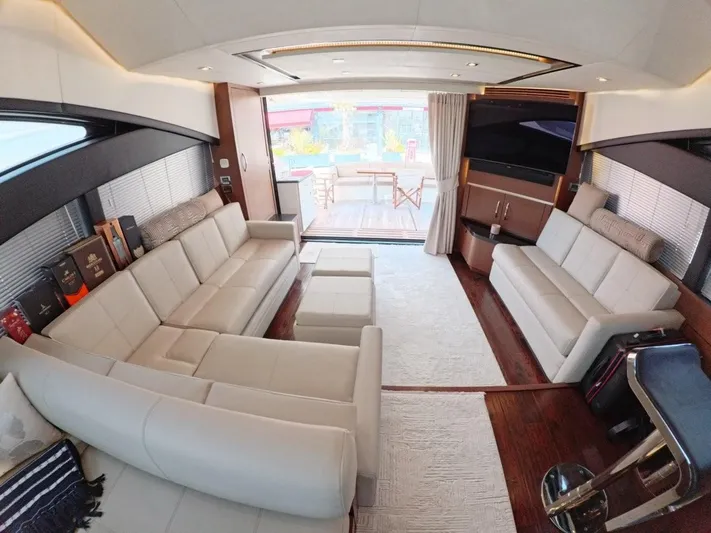  Yacht Photos Pics Luxurious interior of 2016 Sea Ray L650 Fly yacht with elegant seating and modern design.