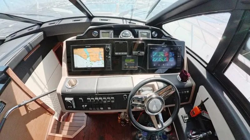  Yacht Photos Pics Cockpit of 2016 Sea Ray L650 Fly yacht with advanced navigation systems.