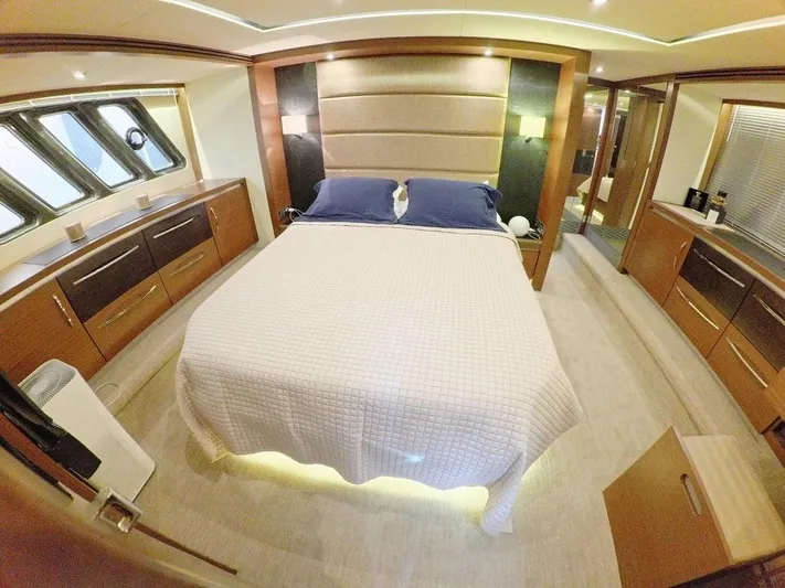  Yacht Photos Pics Luxurious bedroom interior of 2016 Sea Ray L650 Fly yacht with modern design.