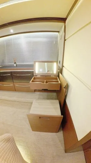  Yacht Photos Pics Luxurious interior of 2016 Sea Ray L650 Fly yacht with elegant wooden cabinetry.