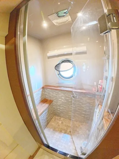  Yacht Photos Pics 2016 Sea Ray L650 Fly yacht shower with glass door and porthole window.