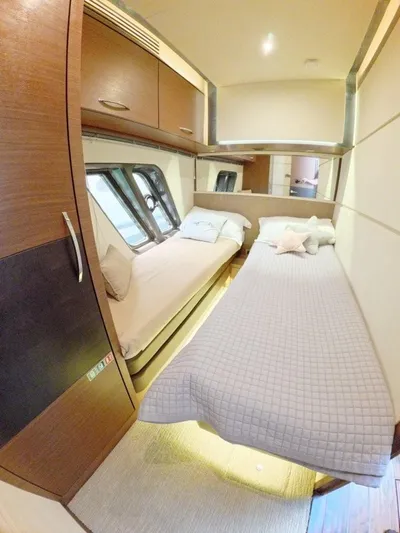  Yacht Photos Pics 2016 Sea Ray L650 Fly cabin interior with twin beds and modern design.