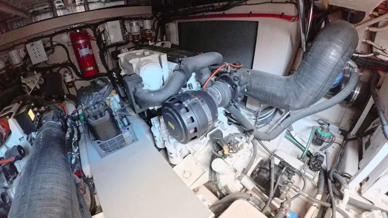  Yacht Photos Pics Engine room of 2016 Sea Ray L650 Fly yacht, showcasing mechanical components and systems.