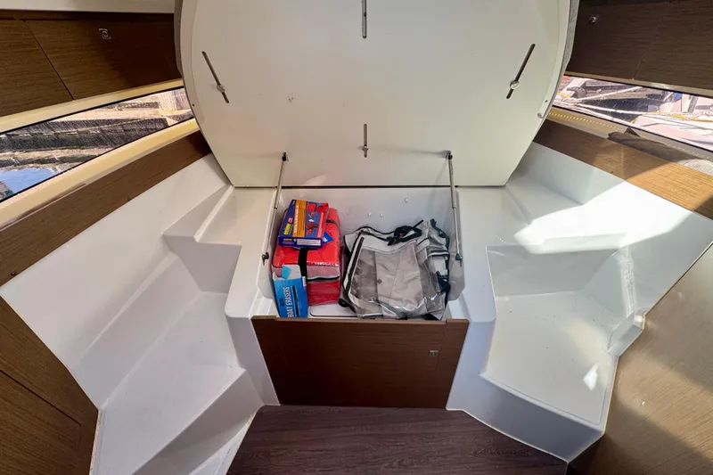 Shanty Town Yacht Photos Pics Interior storage compartment of 2020 Jeanneau NC 895 boat with safety gear.