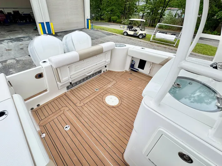  Yacht Photos Pics 2018 Robalo R302 Center Console boat with teak deck and dual engines.
