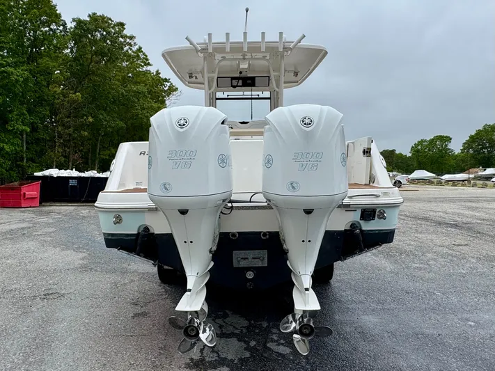  Yacht Photos Pics 2018 Robalo R302 Center Console boat with twin 300 V6 engines, rear view.