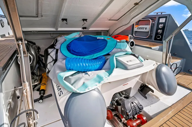 One Love Yacht Photos Pics 2019 Fjord 52 Open yacht storage area with water sports equipment and accessories.
