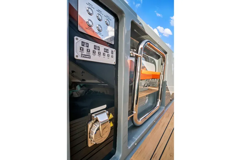 One Love Yacht Photos Pics 2019 Fjord 52 Open yacht control panel with sleek design and chrome accents.