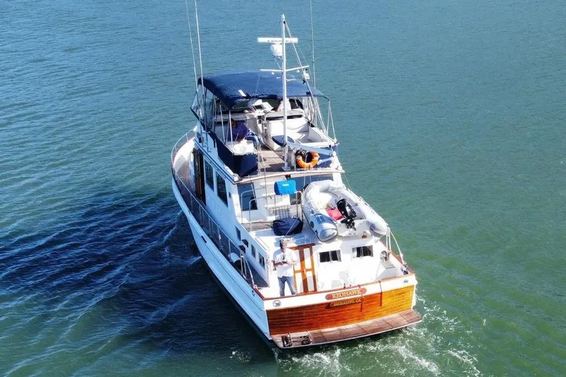 Redhawk Yacht Photos Pics 1996 Grand Banks 46 Classic yacht cruising on open water.