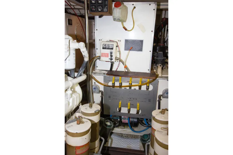 Redhawk Yacht Photos Pics Engine room of 1996 Grand Banks 46 Classic yacht, featuring fuel system components.