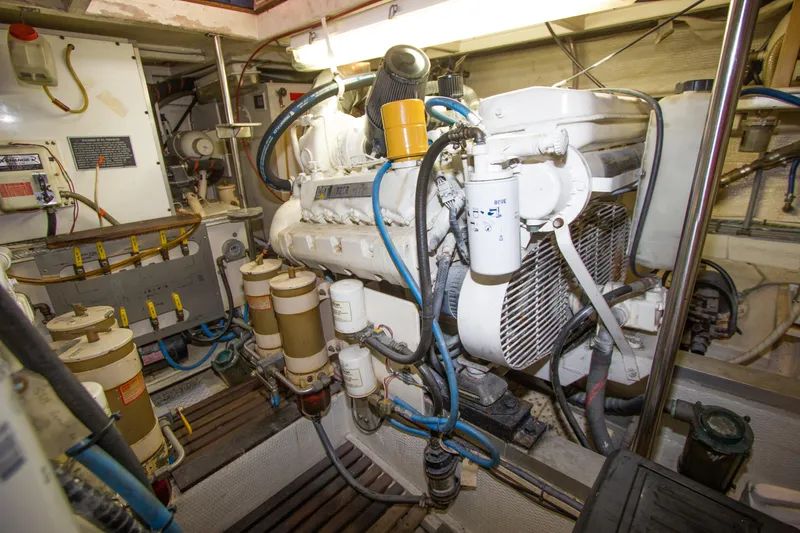 Redhawk Yacht Photos Pics Engine room of a 1996 Grand Banks 46 Classic yacht, showcasing mechanical components and systems.